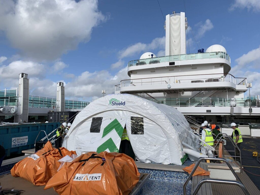 Shield-branded Njordair Fast Tents covering the pool areas on the cruise ship deck during refurbishment