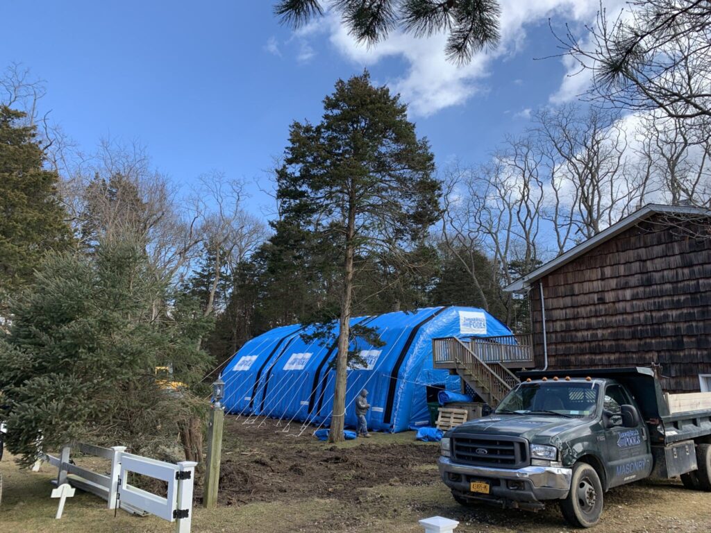 Njordair Constant Air modules covering the full swimming pool footprint on the Long Island site
