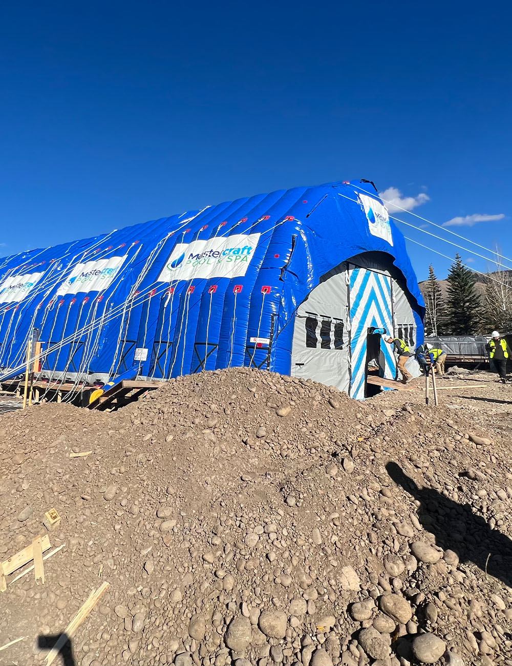 Six CA-14 tents enclosed the work zone for a commercial pool resurfacing project. The setup kept out debris, minimized weather delays, and ensured the project was completed on schedule.